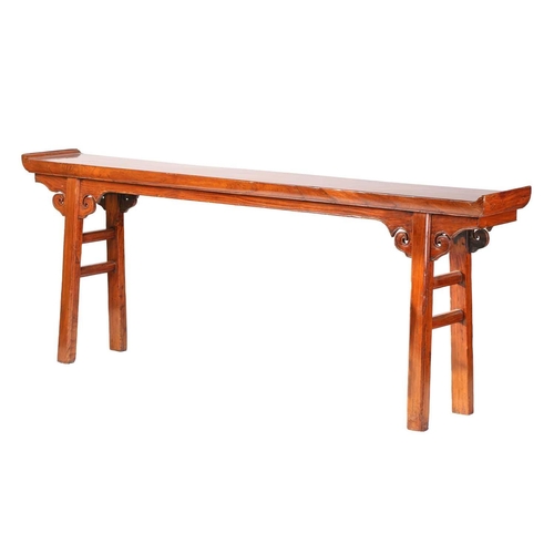 218 - A Chinese elm altar table with everted ends, scroll frieze and simple square supports. 229 cm wide x... 