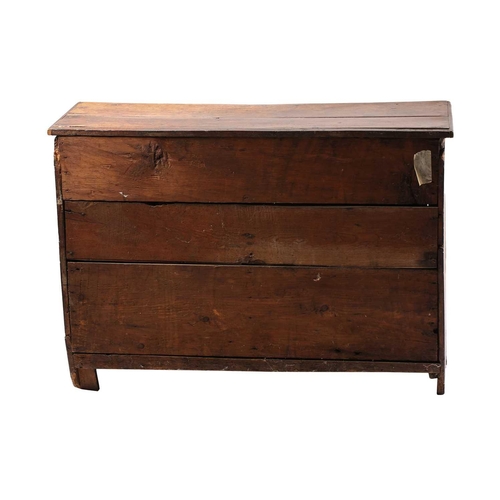 224 - An 18th century and later oak and elm dresser with a planked top above a bank of three short drawers... 