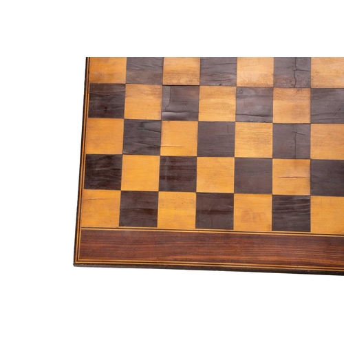 226 - A 19th century inlaid games board, with chess to one side and another board game on the other with p... 