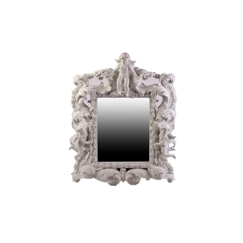 228 - An impressive white-painted and carved composition Baroque console table and wall mirror with a prof... 