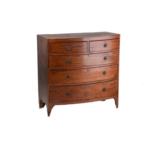 233 - A George IV mahogany caddy topped bow-fronted chest of two short over three long drawers, supported ... 