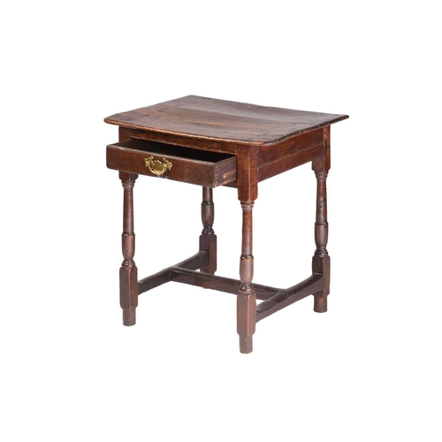 242 - A late 17th-century oak single-drawer side table with a planked top and a single frieze drawer on Do... 