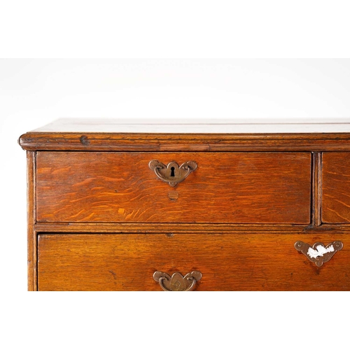 249 - An 18th century oak chest on later stand, the moulded edge top over two short and three long graduat... 