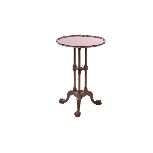 250 - A George III and later mahogany tripod table with a plain circular top and unusual 