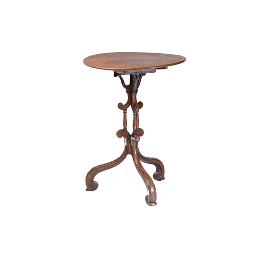 250 - A George III and later mahogany tripod table with a plain circular top and unusual 