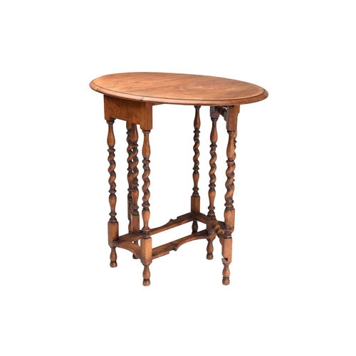 250 - A George III and later mahogany tripod table with a plain circular top and unusual 