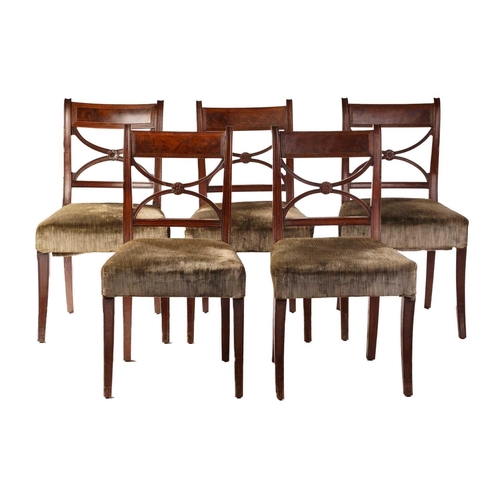 256 - A set of six Regency mahogany dining chairs, the tablet and cross frame backs above stuff-over seats... 