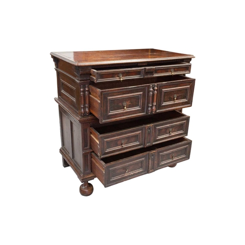 257 - A late 17th-century walnut and oak two-section four-drawer chest of drawers. with split bobbin appli... 