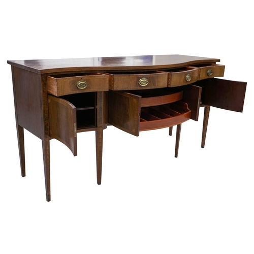 260 - A Friedman Brothers 1929; a George III style inlaid mahogany, serpentine kneehole sideboard with fou... 