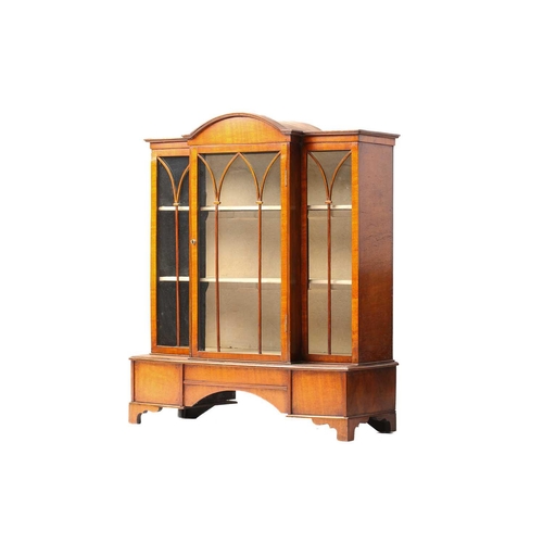 261 - An early 20th-century mahogany miniature single-door breakfront bookcase with a domed central sectio... 