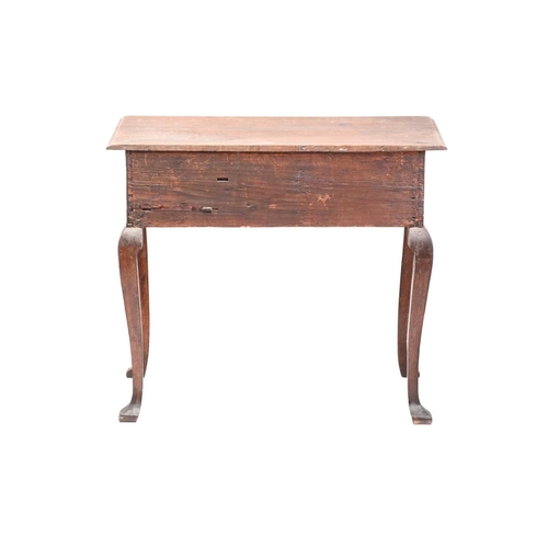 267 - An early 18th-century oak kneehole lowboy with moulded top above two short and one frieze drawer all... 