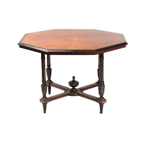 279 - A late Victorian ebonized and amboyna veneered octagonal centre table in the manner of Maple & Co, t... 