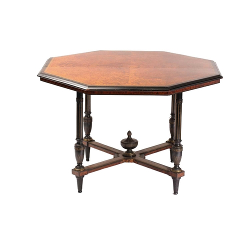 279 - A late Victorian ebonized and amboyna veneered octagonal centre table in the manner of Maple & Co, t... 