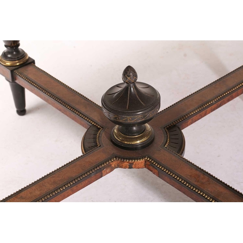 279 - A late Victorian ebonized and amboyna veneered octagonal centre table in the manner of Maple & Co, t... 