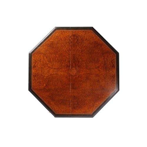 279 - A late Victorian ebonized and amboyna veneered octagonal centre table in the manner of Maple & Co, t... 