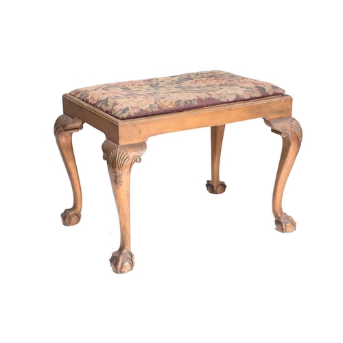 290 - A George I style carved and gilt wood dressing stool, c1920s, fitted a drop-in seat above shell-carv... 