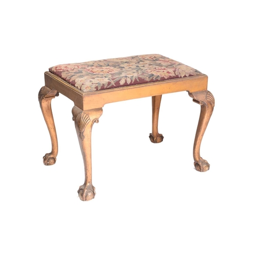 290 - A George I style carved and gilt wood dressing stool, c1920s, fitted a drop-in seat above shell-carv... 