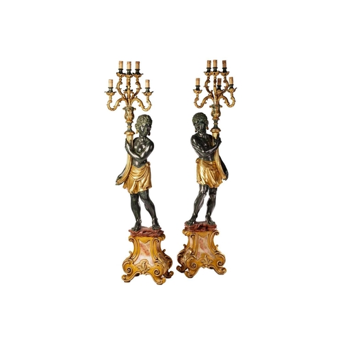 294 - A large pair of 17th-century Venetian style bronzed and parcel gilt composition blackamoor floor lam... 