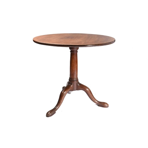 297 - A George III mahogany circular flip-top wine table with a 