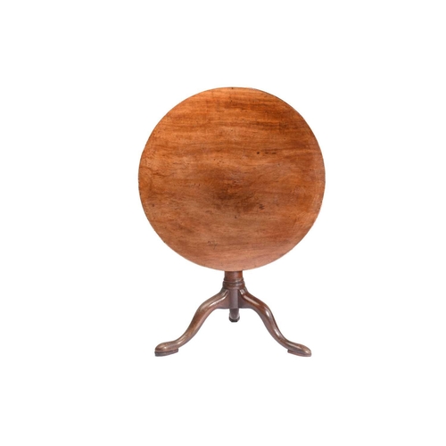 297 - A George III mahogany circular flip-top wine table with a 