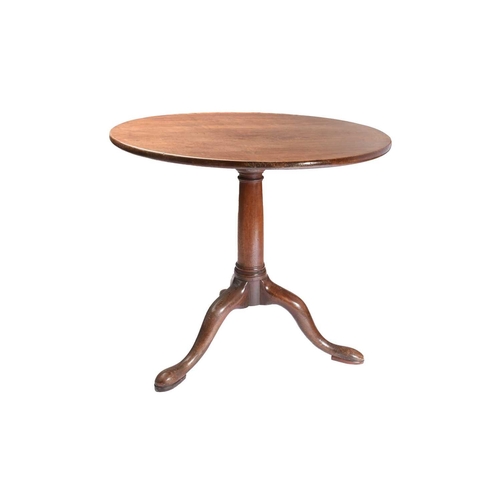 297 - A George III mahogany circular flip-top wine table with a 