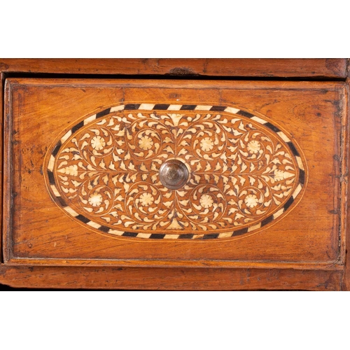 300 - An Anglo-Indian bone and ebony inlaid cabinet, early 20th century, with a shaped broken arch pedimen... 