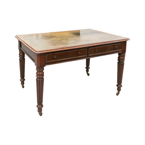 301 - A George IV Gillows-style mahogany writing table; the cross-banded top with inset tooled green leath... 