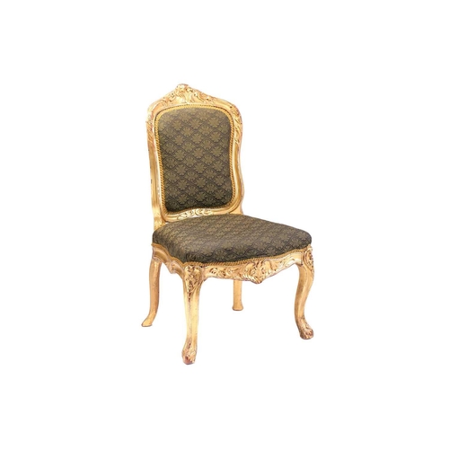 303 - A George III carved mahogany (?) and gilt gesso slide chair in the 