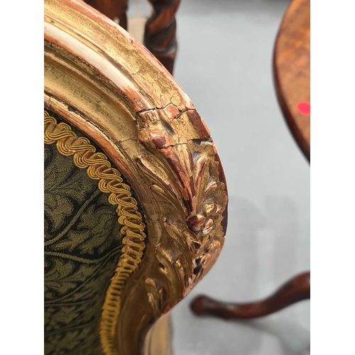 303 - A George III carved mahogany (?) and gilt gesso slide chair in the 