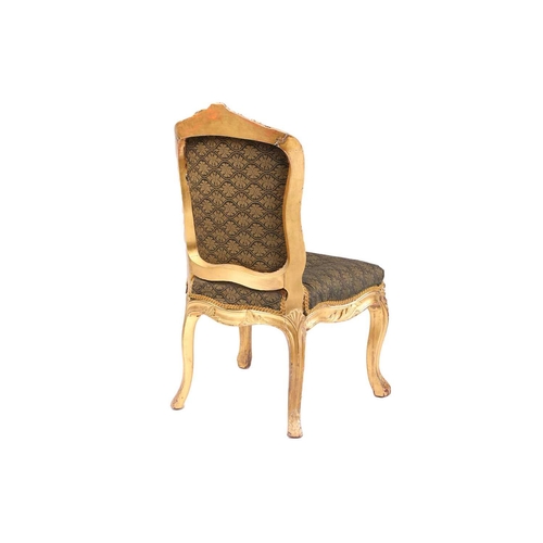 303 - A George III carved mahogany (?) and gilt gesso slide chair in the 