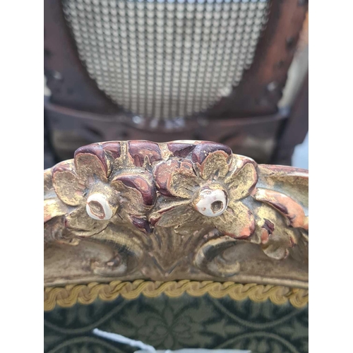 303 - A George III carved mahogany (?) and gilt gesso slide chair in the 