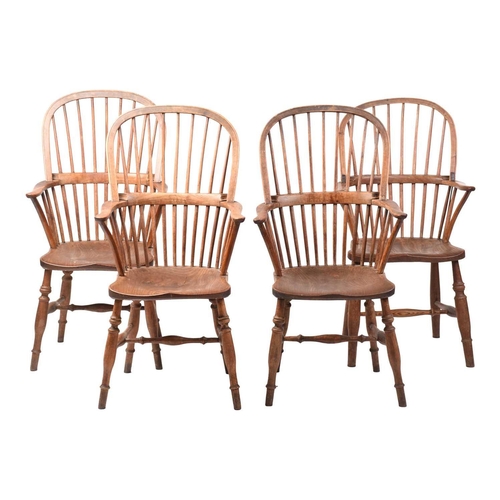 307 - A pair of 19th-century hoop-back Windsor open armchairs, with simple spindle backs and swept arms ab... 