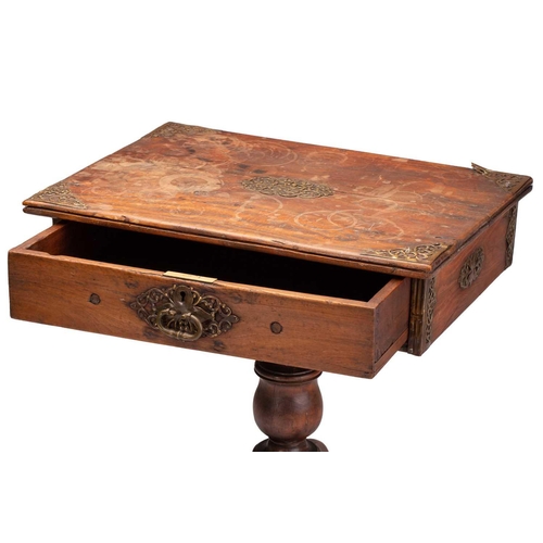 314 - A 19th-century Dutch colonial, Sri Lankan, ebony and teakwood square-topped pedestal table, with app... 