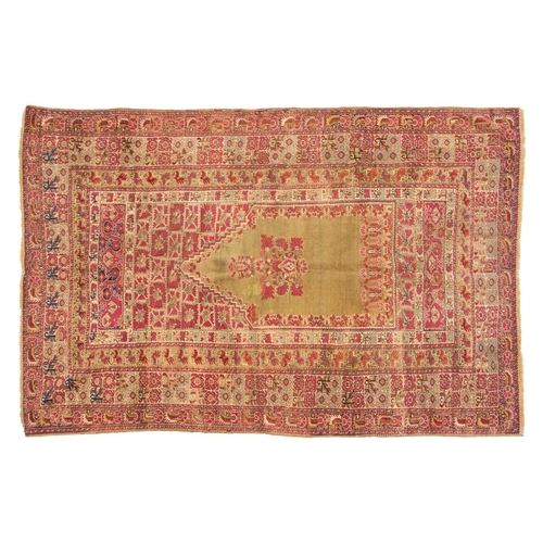 322 - A large old Anatolian probably Ghiordes prayer rug, probably early/mid 20th century the muted green ... 