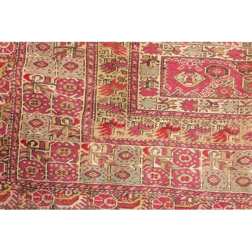 322 - A large old Anatolian probably Ghiordes prayer rug, probably early/mid 20th century the muted green ... 