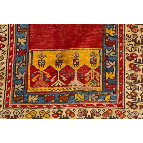 327 - An old central Anatolian prayer rug, probably from Konya, mid-20th century with an angular hooked mi... 