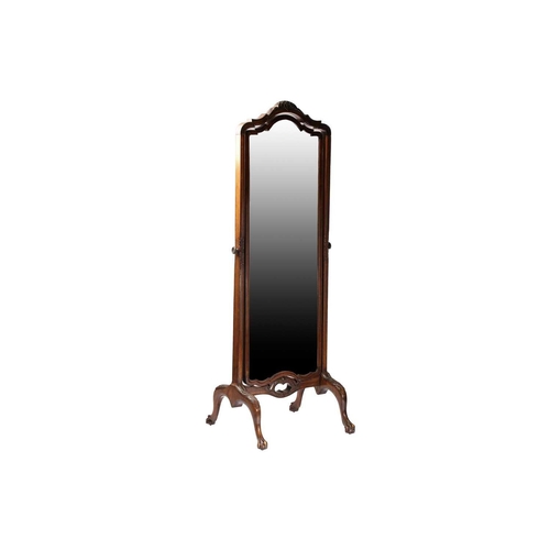 349 - A George III style mahogany cheval dressing mirror, 20th century, With leaf capped arch topped frame... 