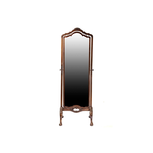 349 - A George III style mahogany cheval dressing mirror, 20th century, With leaf capped arch topped frame... 