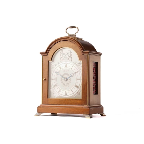 356 - A J.W. Elliott for Garrard limited edition Silver Jubilee commemorative mantel clock, with arched ca... 