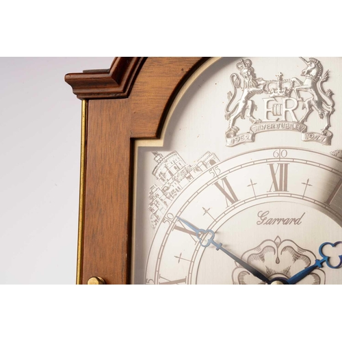 356 - A J.W. Elliott for Garrard limited edition Silver Jubilee commemorative mantel clock, with arched ca... 