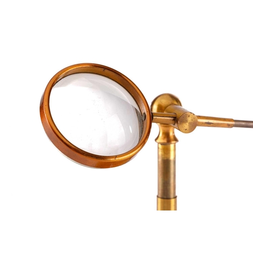 359 - Two lacquered brass bullseye condenser lenses, each with 1¾ inch lens and adjustable arms and stem (... 