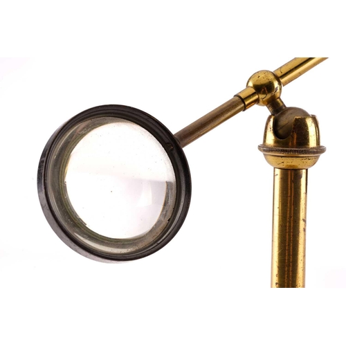 359 - Two lacquered brass bullseye condenser lenses, each with 1¾ inch lens and adjustable arms and stem (... 