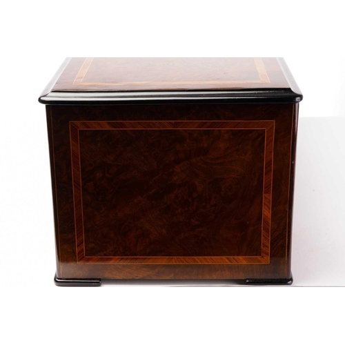 374 - A Swiss twelve-air music box, late 19th century, with tulipwood banded and ebonized figured walnut c... 