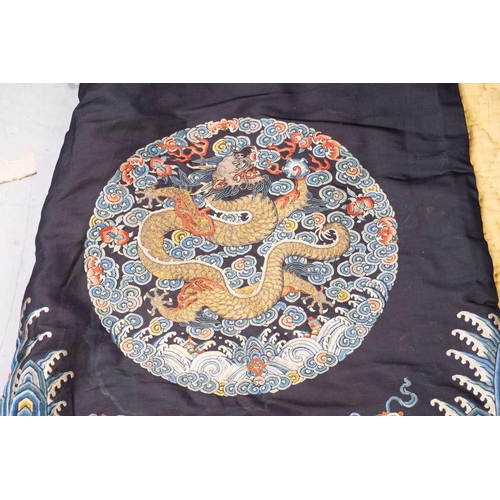 379 - A Chinese cobalt blue silk courtiers waistcoat(?) with six bullion embroidered Imperial dragon round... 