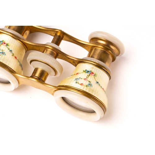 390 - A pair of gilt metal and enamel opera glasses with mother of pearl detail and a pair of gilt metal f... 