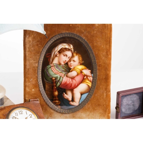 394 - A painted porcelain plaque depicting the Madonna della Sedia after Raphael, unmarked 14.5 x 10 cm, a... 