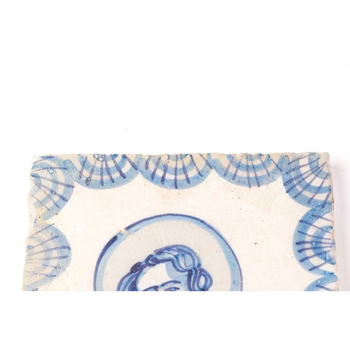 405 - A 19th/ 20th -century pair square of Delft pottery tiles combining to portray St. Sebastion chained ... 