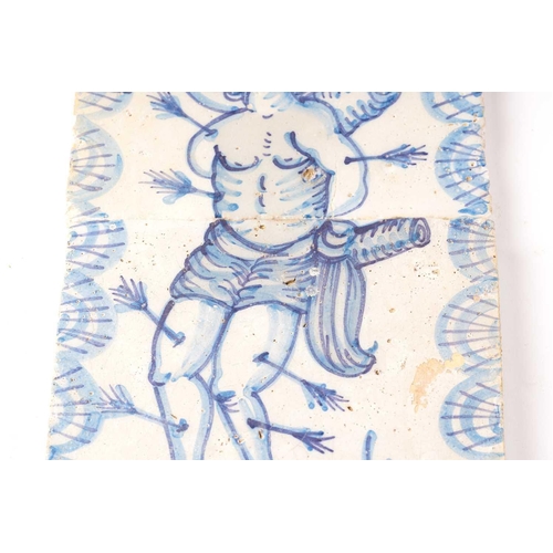 405 - A 19th/ 20th -century pair square of Delft pottery tiles combining to portray St. Sebastion chained ... 