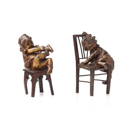 417 - After Juan Clara, a bronze figure of a girl seated on a stool putting on a shoe, signed and numbered... 