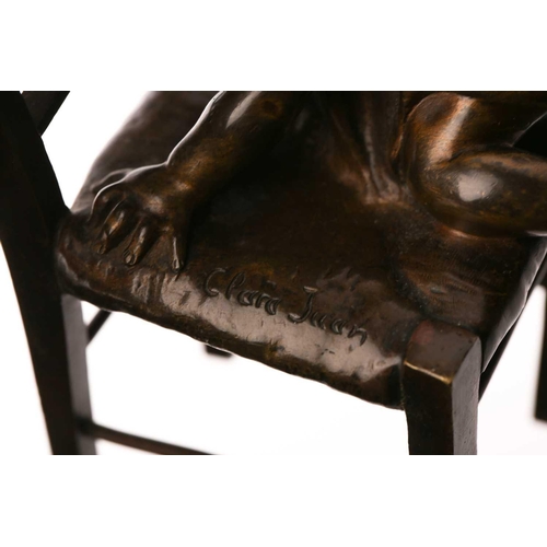 417 - After Juan Clara, a bronze figure of a girl seated on a stool putting on a shoe, signed and numbered... 